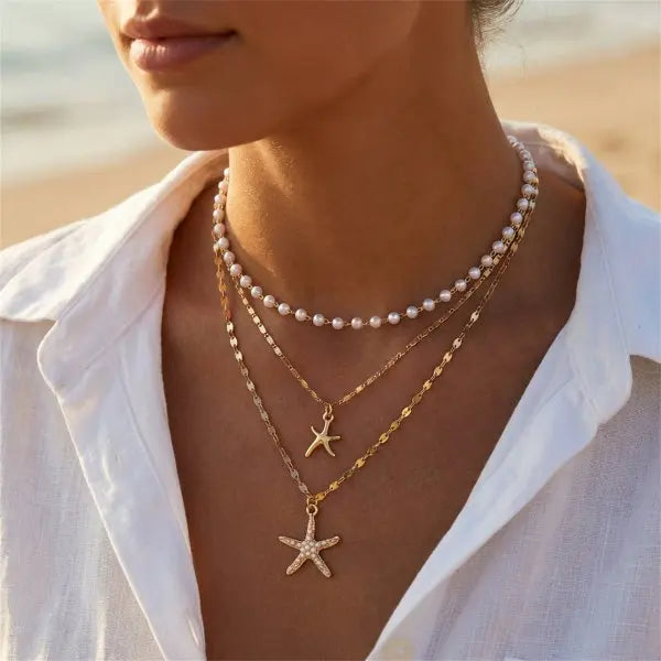 Boho Mehrschichtige Muschel-Seestern-Anhänger-Halskette für Frauen Handgefertigte Perlen-Imitationsperlen-Choker Strandparty-Schmuck Geschenk So ist Leben