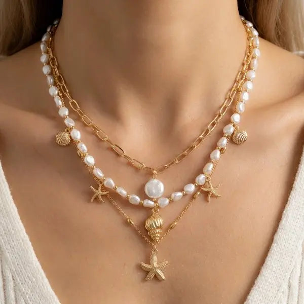 Boho Mehrschichtige Muschel-Seestern-Anhänger-Halskette für Frauen Handgefertigte Perlen-Imitationsperlen-Choker Strandparty-Schmuck Geschenk So ist Leben