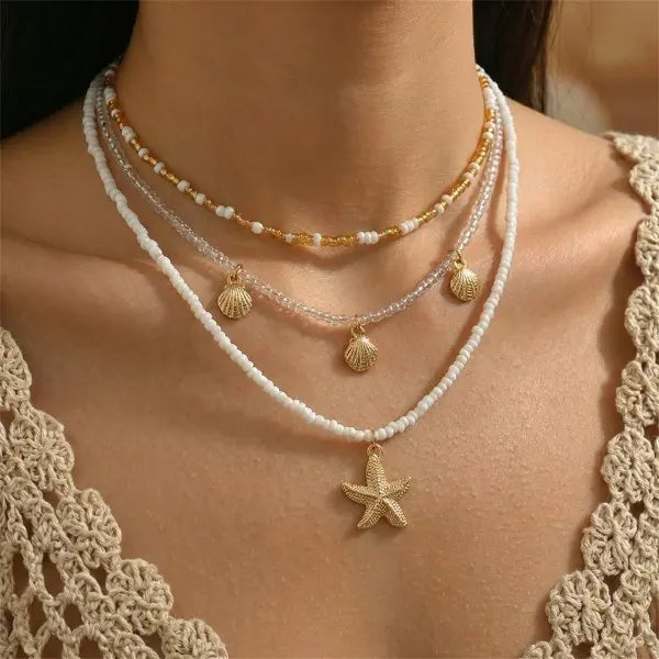Boho Mehrschichtige Muschel-Seestern-Anhänger-Halskette für Frauen Handgefertigte Perlen-Imitationsperlen-Choker Strandparty-Schmuck Geschenk So ist Leben