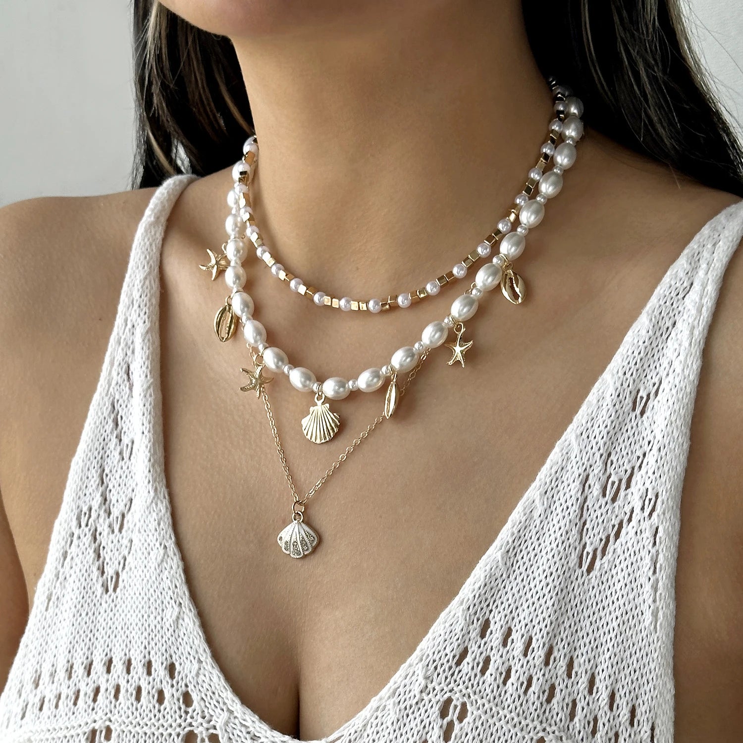 Boho Mehrschichtige Muschel-Seestern-Anhänger-Halskette für Frauen Handgefertigte Perlen-Imitationsperlen-Choker Strandparty-Schmuck Geschenk So ist Leben