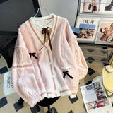 Coquette Strickjacke mit Schleife und Patchwork‑Design - So ist Leben